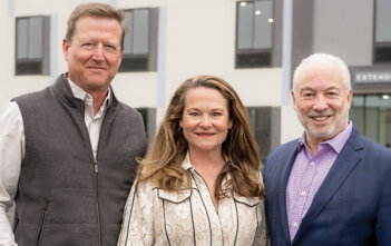 Casey Tippens and Paige York, principals of York Development, with Mike Mueller, president, ECHO Suites Extended Stay by Wyndham